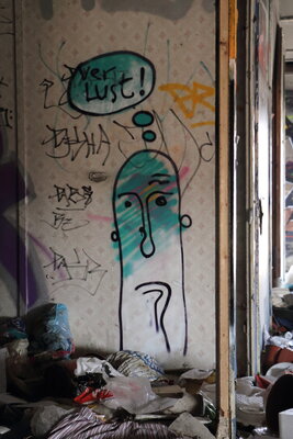 Graffiti bildlich:  Strichkopf und Verlust