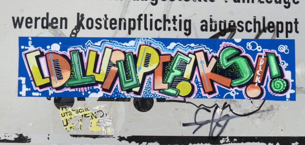 TU ES-Sticker mit Buchstaben-Puzzle
