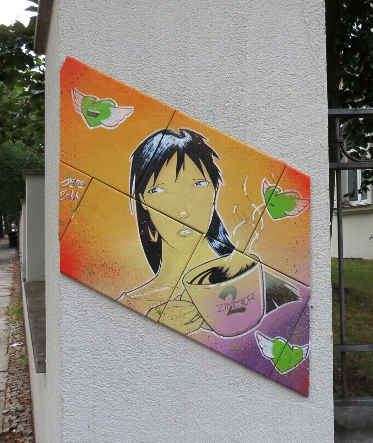 Frauenkopf mit Tasse