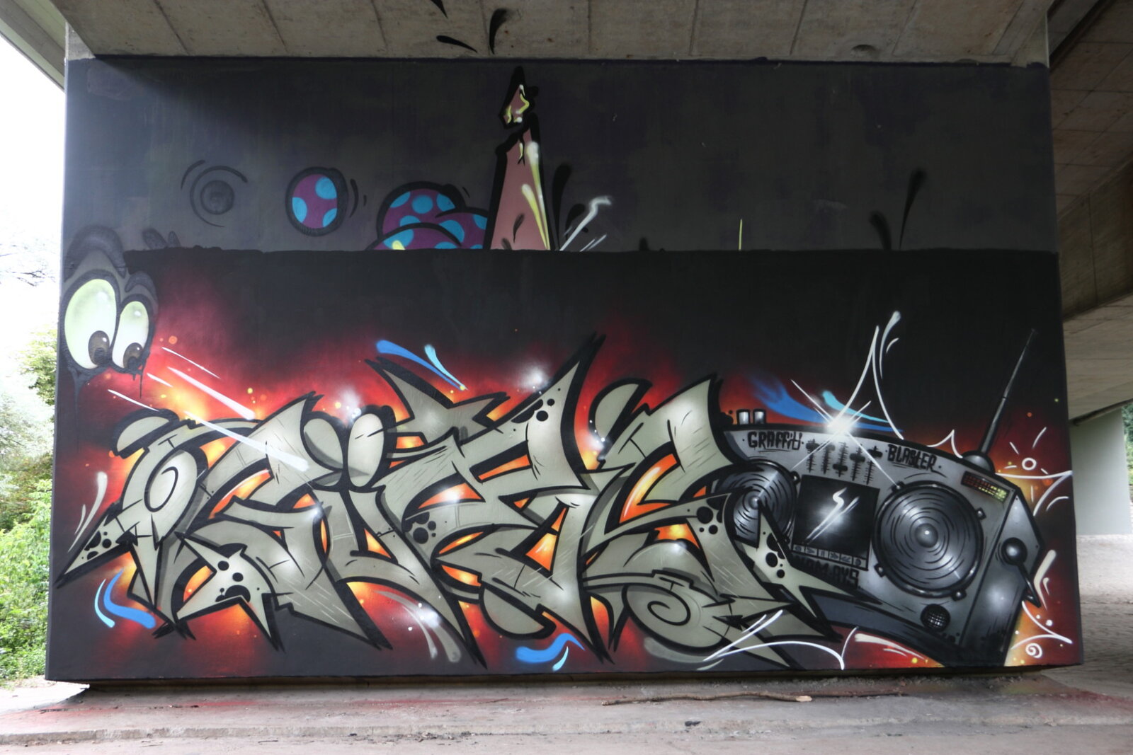 Unter der Brücke (B80-West): Güros mit Graffiti-Blaster und Psycho by SHIZO